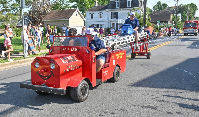 The Lewes Fire Department participants have a little water fun on Little Reds. Shown are (l-r) Trey Von Ellis, Anthony Koot, Liam Stabner and Josh McCready.