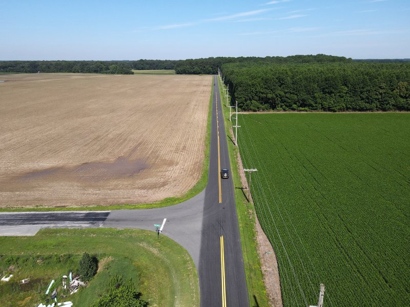 Plans for Cool Spring Crossing, which includes 1,922 homes and nearly 500,000 square feet in commercial space on Route 9 west of Lewes, will be sent to Sussex County Council after the planning & zoning commission recommended approval July 2. The project is planned for both sides of Log Cabin Hill Road, shown here. NICK ROTH PHOTO