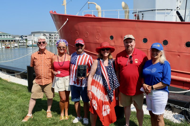 The awards were given out by the Lewes-Rehoboth Rotary Club at the Lightship Overfalls after the parade. First place for most patriotic boat was given to the Lovely Day from Morristown, N.J. Shown are (l-r) Tim Ritzert, Lewes city councilman; Gwen Hanlon, Lovely Day crew; Will Boettcher, Lovely Day captain; Amy Marasco, Lewes mayor; Bob Murphy, Overfalls Foundation board member; and Janine Fitzgerald, Lewes-Rehoboth Rotary Club.