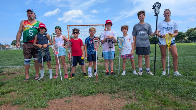 GameBreaker Lacrosse Camps hosted its first four-day camp July 14-17 at Beacon Middle School and will return July 28-31 for the final Delaware camp of the summer. Mark Duncan, far left, is shown with campers (l-r) Webb Ciavarra, Quinn O’Heir, Daniel Weiner, Eli Schiffner, Noah Bauer, Reece O’Heir, Alexander Rodgers and counselor Olivia Burkentine. AARON R. MUSHRUSH PHOTO