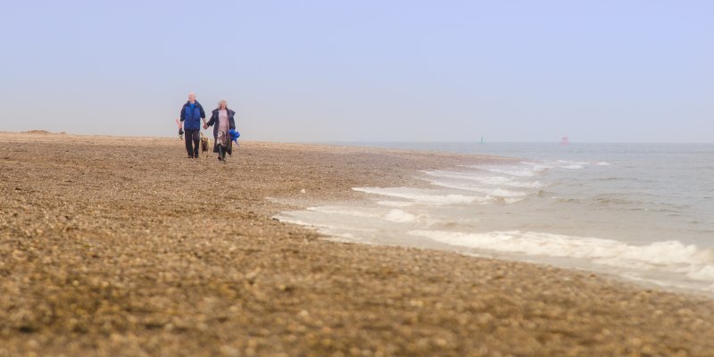 OlderAdultsWalkingOnBeachProcinoWells&WoodlandDelawareEstatePlanning
