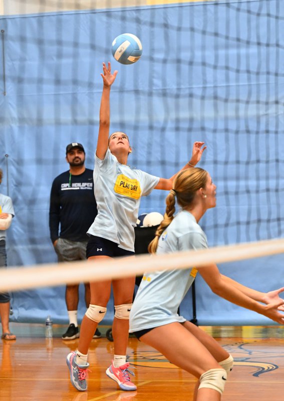 Cape junior Camilla Willis pounds a kill shot in the scrimmage with Conrad.