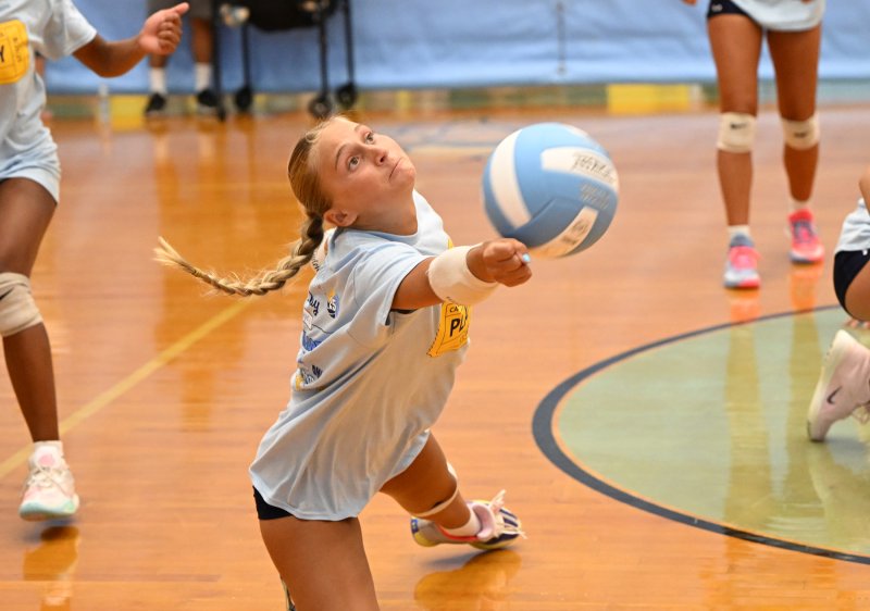 Cape senior defensive specialist Mallory Terhune makes a diving return on a kill attempt from the Caravel front line. DAN COOK PHOTOS