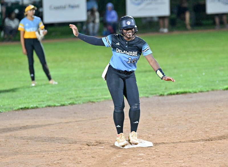 Delaware’s Cierra Lewis does a little dance on second after her bases-clearing double against Hawaii.