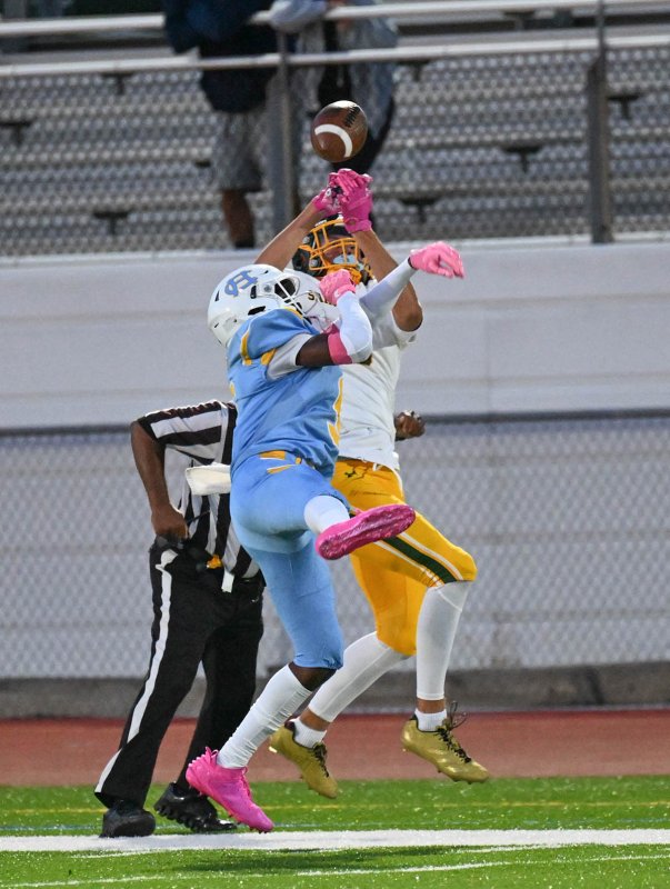Cape senior defensive back Navin Duffy breaks up a pass intended for Spartans wide receiver Maxwell Batten.