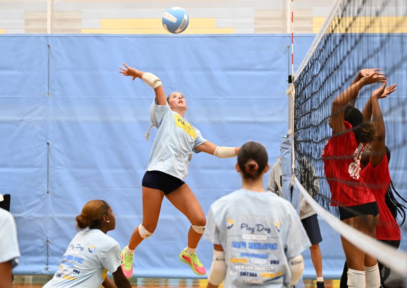 Cape senior Rylee Ockels pounds a kill shot against Conrad.