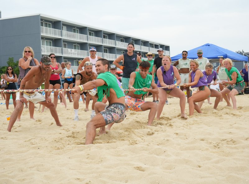 The Purple Parrot works together during a round of tug-of-war. On the rope are (l-r) George Yanchenko, Tate Wisniewski, Gabrielle “Elle” Davis, Grace Mercer, Madelyn Reed and Zachary Davis.