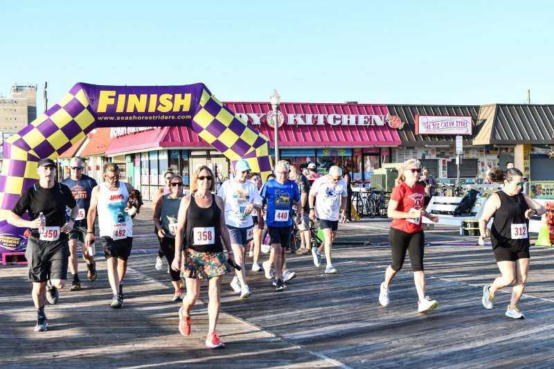 The word walk is in Rehoboth Boardwalk for a reason. Walkers leave the starting line at the Rehoboth Beach Patrol 5K.