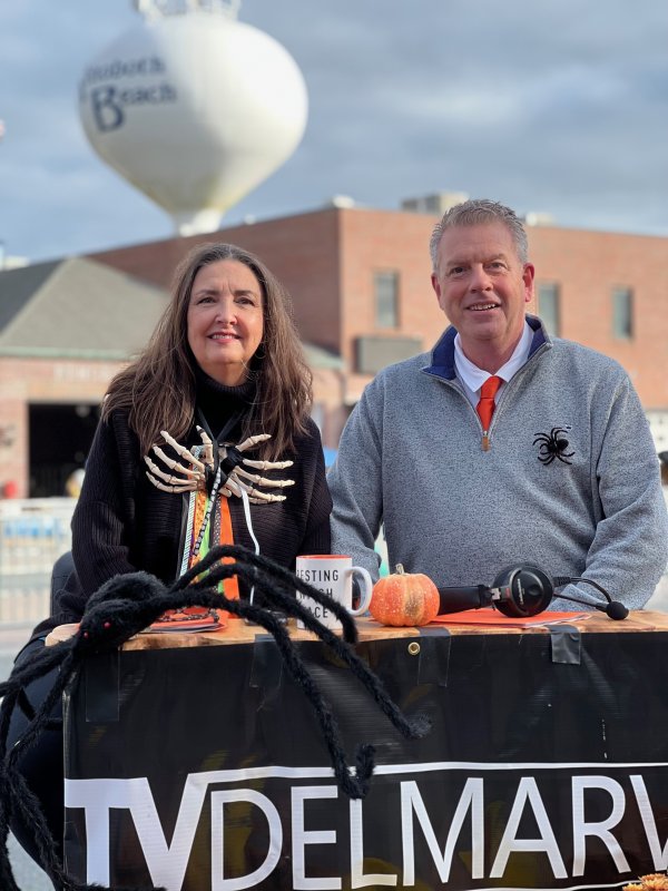 Michael Sprouse, with co-host Nancy Alexander, on the TV Delmarva set at the 2022 Sea Witch Parade. Sprouse and Alexander have been doing the broadcast together since 2015.