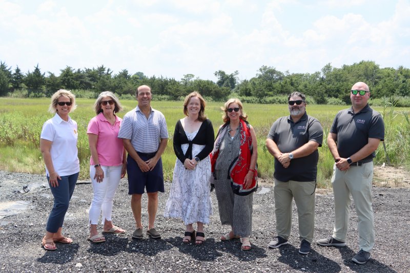 Lt. Gov. Kyle Evans Gay toured Cedar Street July 30, near the area where the flood gate project would be built. The Cedar Street and Fourth Street projects are in line to receive money from the city’s new resiliency fund. Shown are Ellen Lorraine McCabe, Lewes city manager; Janet Reeves, Lewes assistant city manager; Khalil Saliba, deputy mayor; Lt. Gov. Kyle Evans Gay; Amy Marasco, Lewes mayor; Brent Jett, George Miles and Buhr engineer; and Andrew Lyons, GMB engineer.