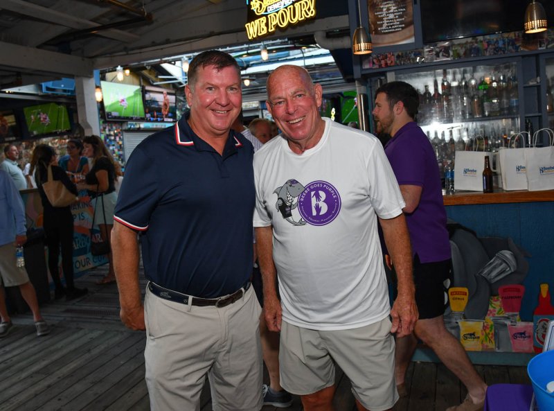 The Starboard owner Steve “Monty” Montgomery, left, and former Delaware Speaker of the House Pete Schwartzkopf have a moment at the event.