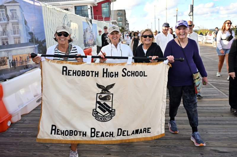 Rehoboth High School alumni walking in the piping out parade are (l-r) Jackie Johnson Shockley, Hope Wilson Lavachia, Gail Nowakowski and Barbara Bailey.