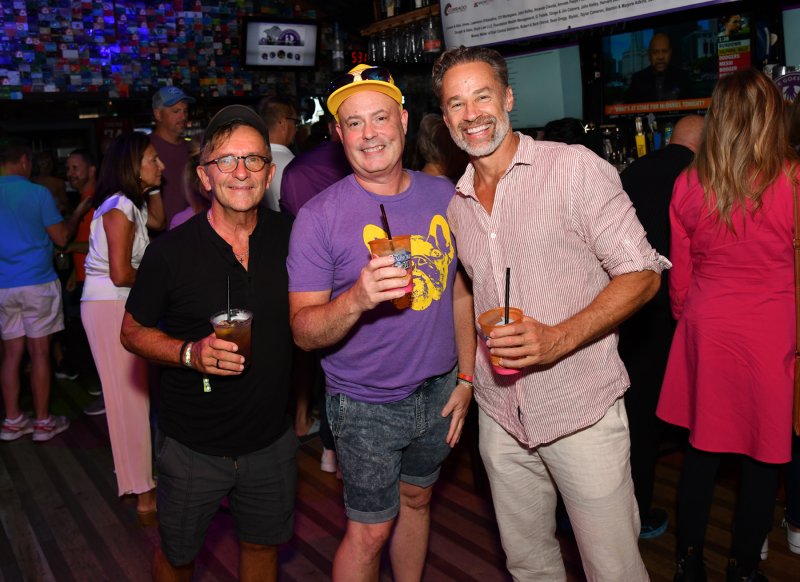 Having some tasty libations are (l-r) Michael Biegay, Chad Stover and Don Stegall.