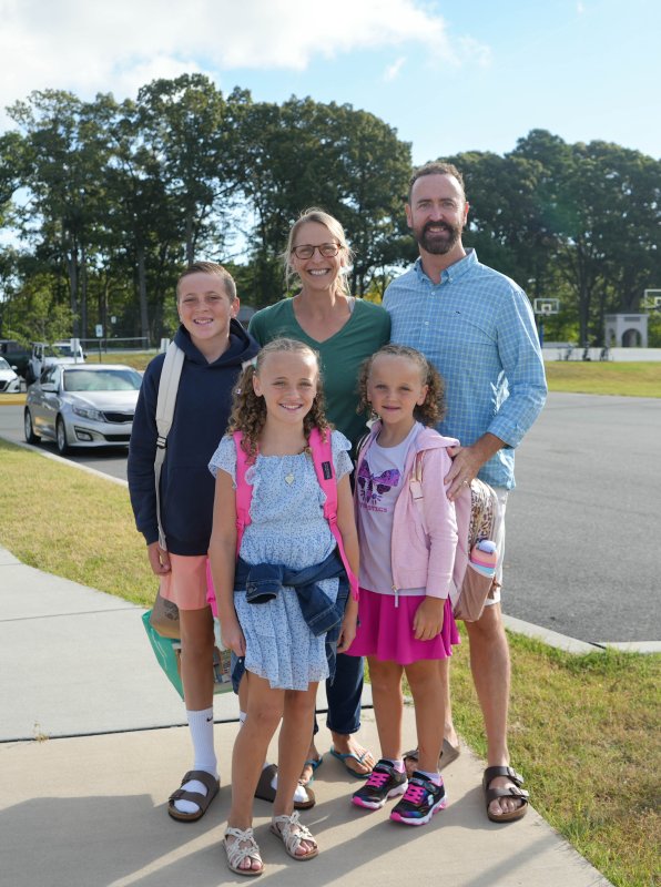 The Dunnes get ready to send their three children off to their first day of school at Rehoboth Elementary. In back are (l-r) Preston and parents Kat and Stephen. In the front are sisters Fiona and Alannah. ELLEN MCINTYRE PHOTO