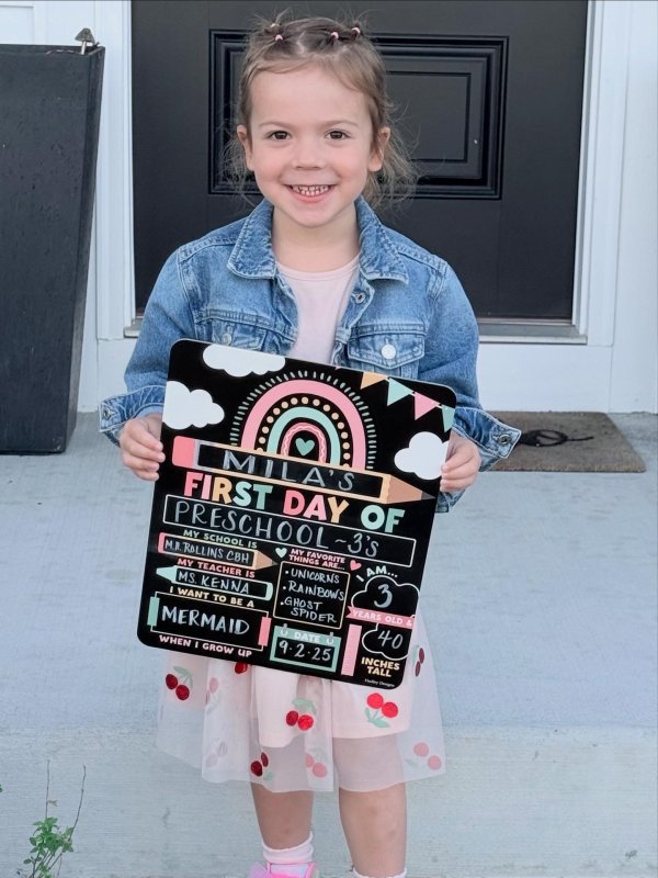 Mila Baker, 3, is excited for her first day of school at The Margaret H. Rollins Child Development Center.