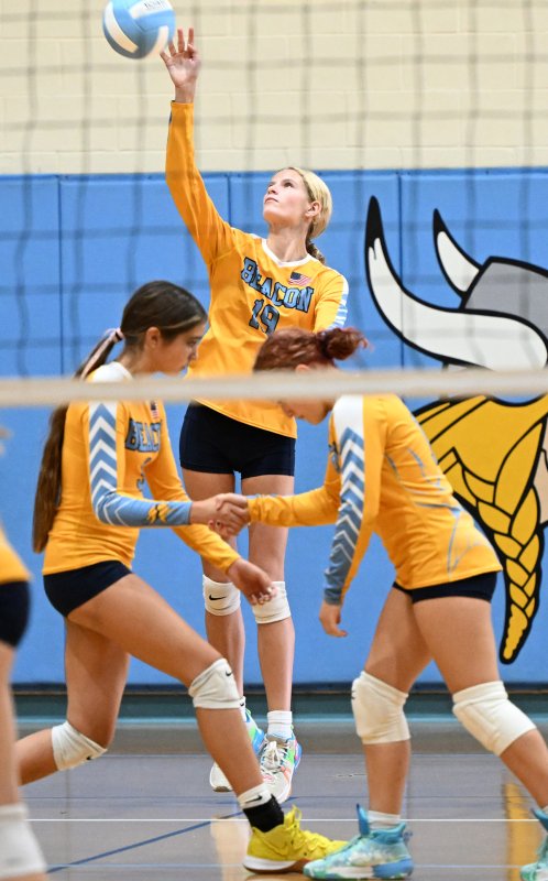 Aaliyah Fruchtman slams a serve for Beacon.