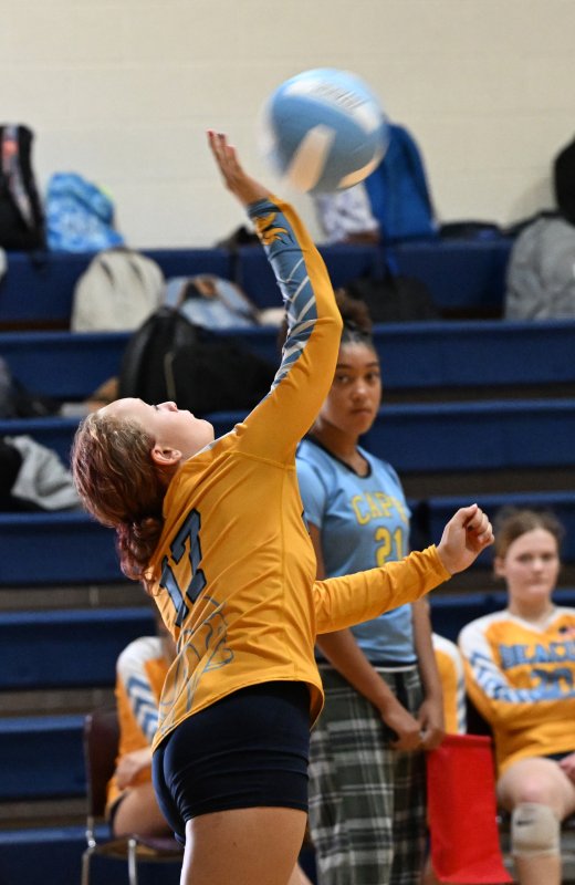 Beacon’s Anna Beall pounds a serve.