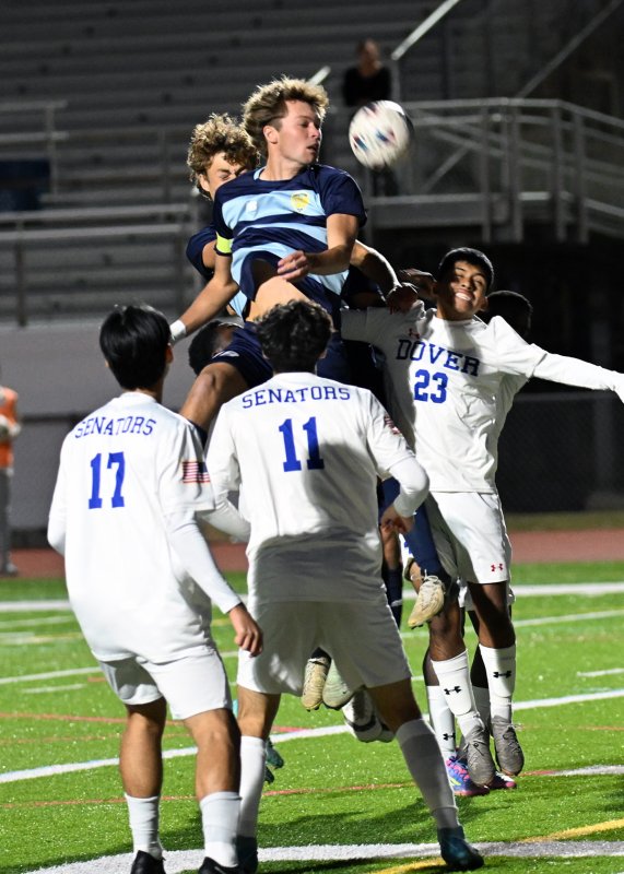 Cape senior Lawson Whaley heads a shot off a corner kick.