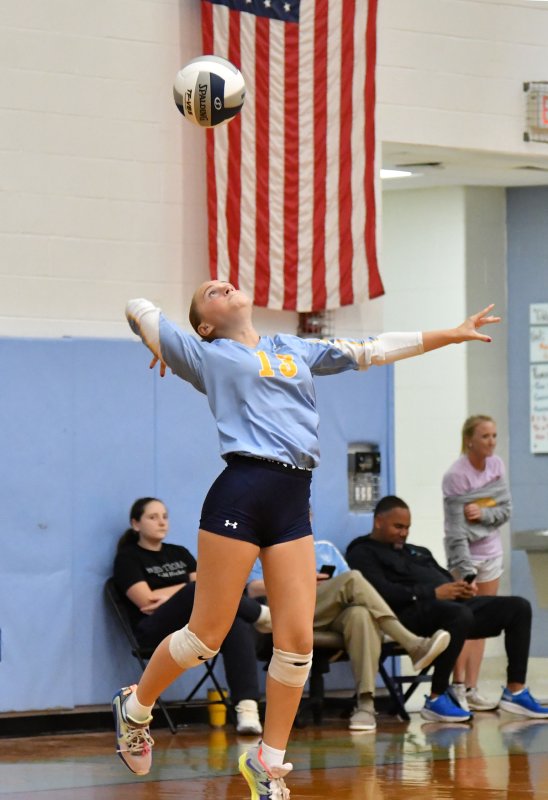 Senior Mallory Terhune serves an ace.