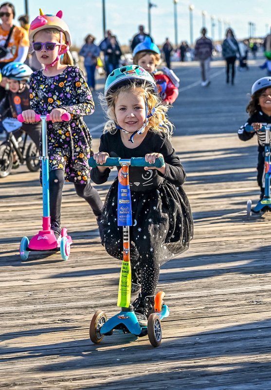 Ellie Arnold, 3, leads the group during the third heat of the Tyke Bike event. DAN COOK PHOTO