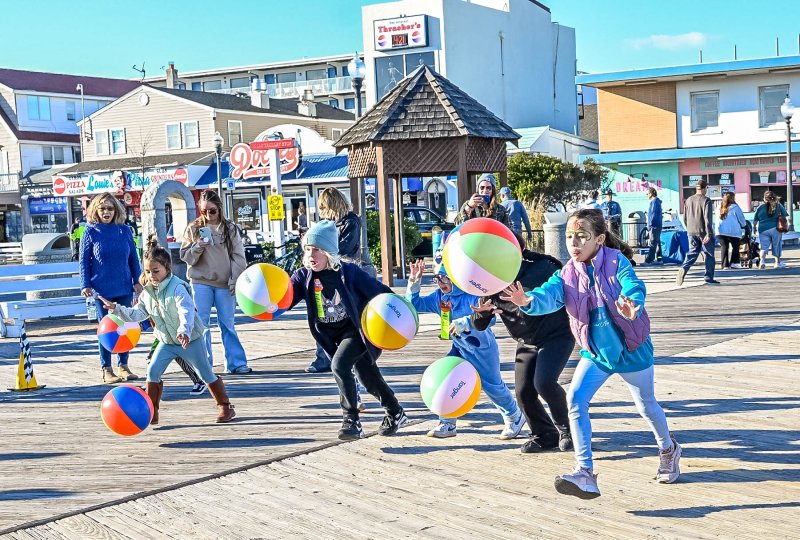 Racers take off in the second heat of the beach ball race. DAN COOK PHOTO