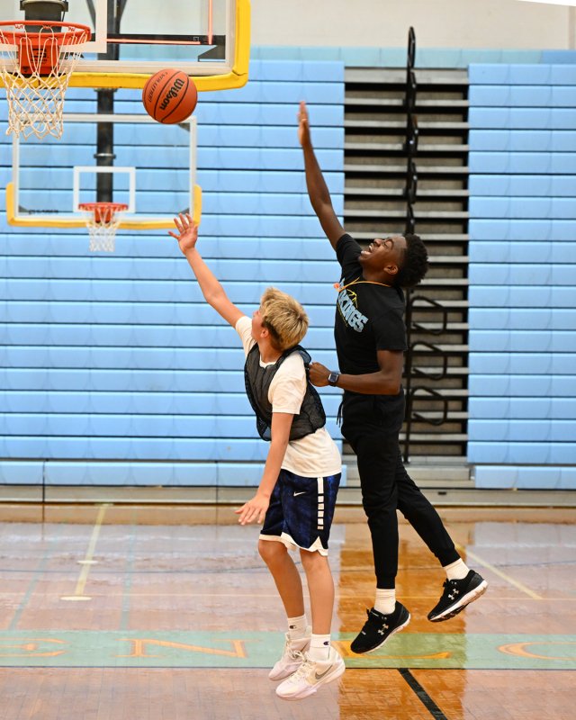 James Frederick shoots under coach Stephen Sivels.