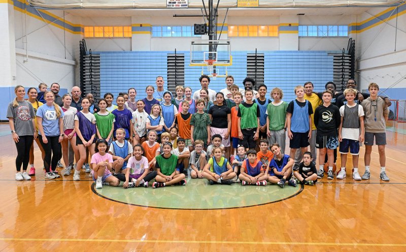 Players and coaches from the Cape basketball preseason clinic get together for a group picture. DAN COOK PHOTOS