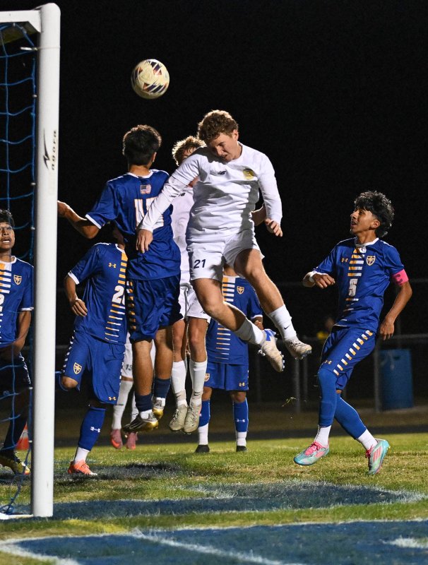 Cape junior Austin Tyndall heads a shot on goal.