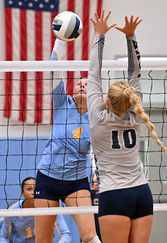 Cape junior Harper Mamele pounds a kill.