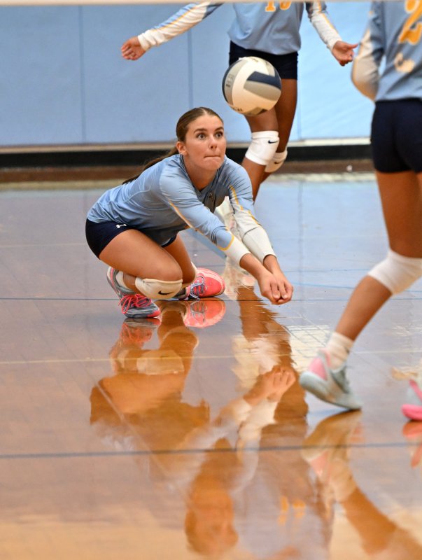 Cape junior Camilla Willis bumps a return.
