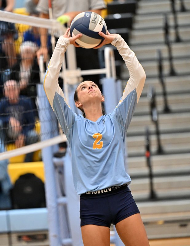 Senior setter Kaylee Sockriter puts up an assist for the Vikings.