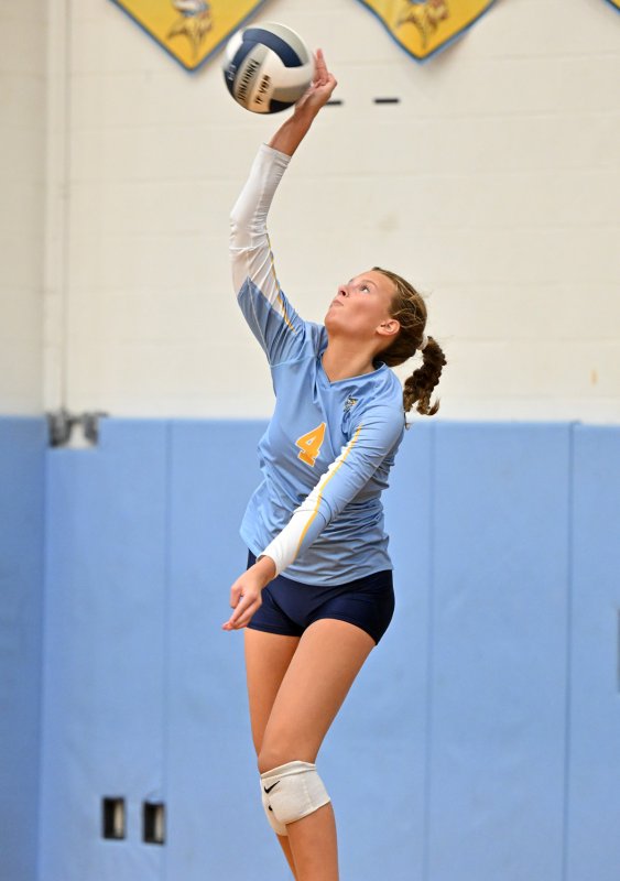 Cape junior Harper Mamele pounds a serve.