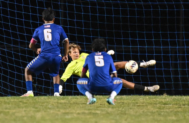 Cape keeper Anton Schierenberg makes the second penalty kick stop to preserve the victory.