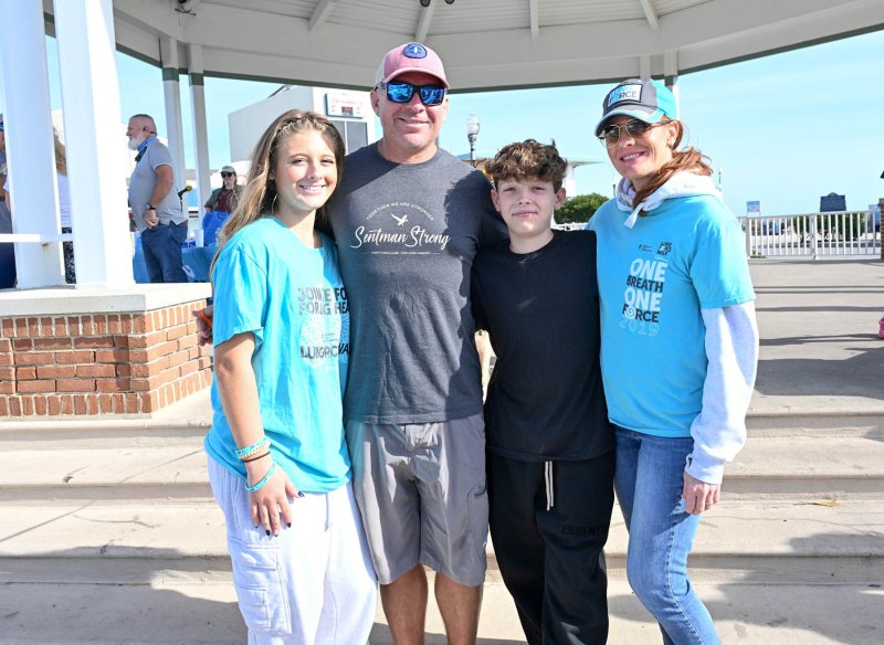 Walking as part of Sentman Strong are (l-r) Caroline Perry, Brant Perry, Rhett Perry and Shelley Perry, Doug Sentman’s daughter.