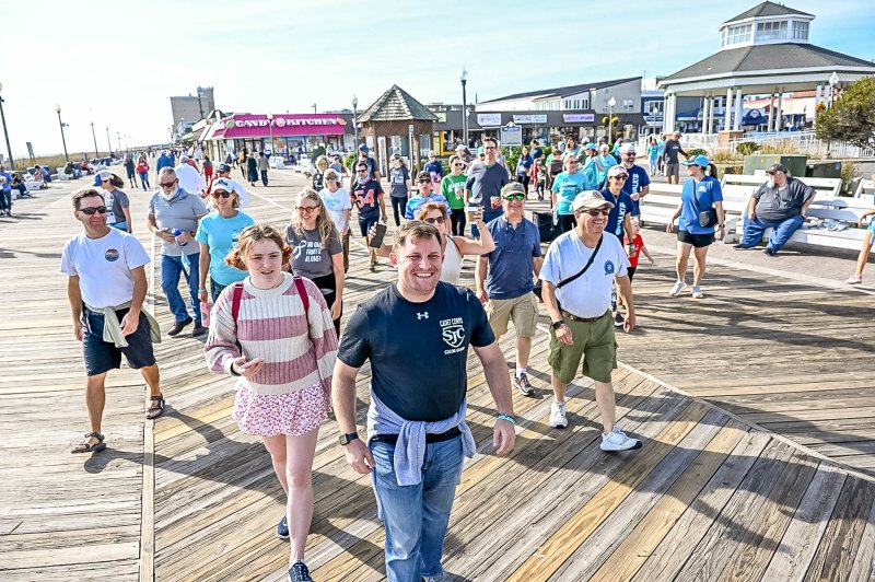 Walkers begin heading north on the Boardwalk.