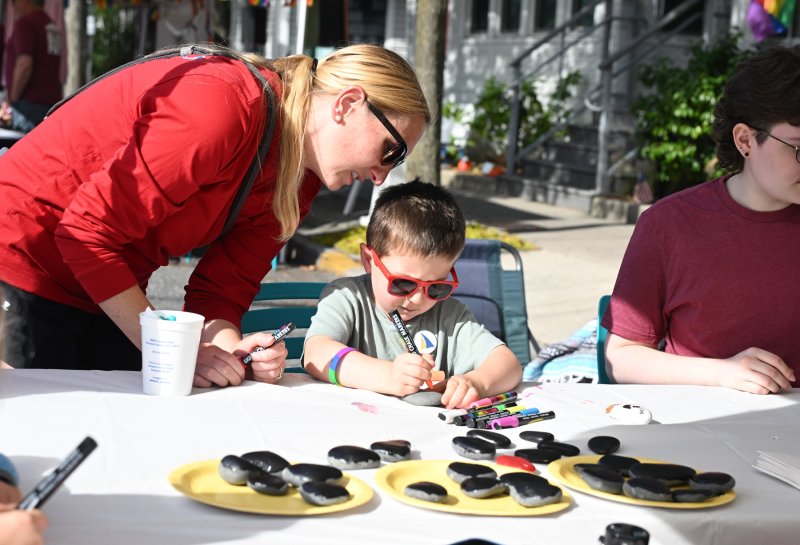 Henry Bradley, 5, works on a craft project with his mom Melissa.