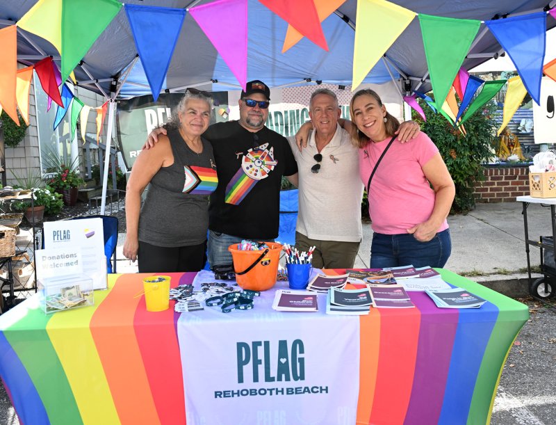 Working the PFLAG booth are (l-r) Lorraine and Dave Fahringer and Keith and Traci Decker. PFLAG is an extended family of the LGBTQ community. They’re  made up of lesbian, gay, bisexual, transgender and queer individuals, family members and allies.