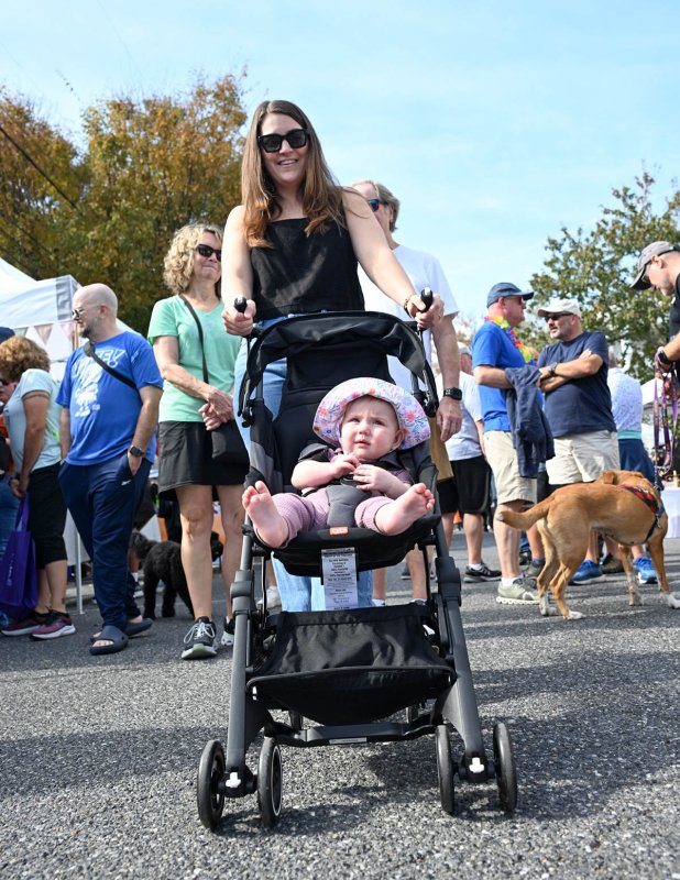 Taking it all in is Isla McCabe, 8 months, and her mom Kira.