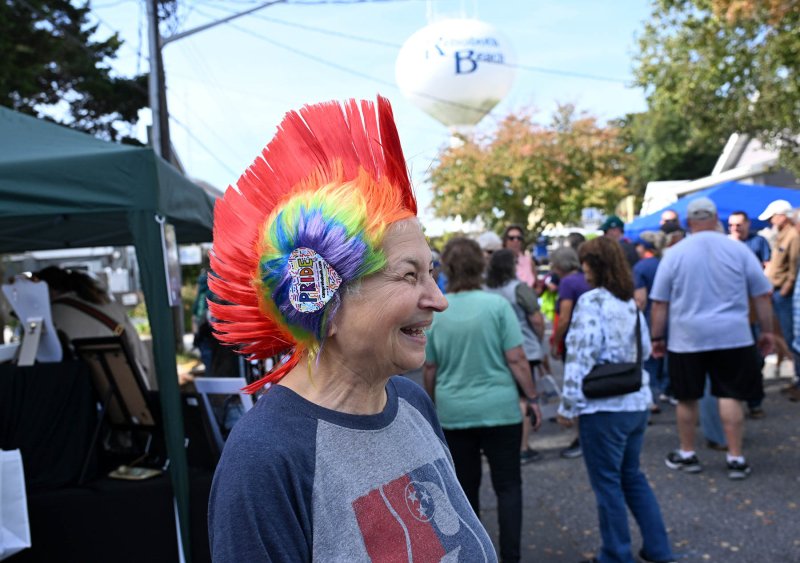 Deb Quinton shows her pride at the CAMP block party.