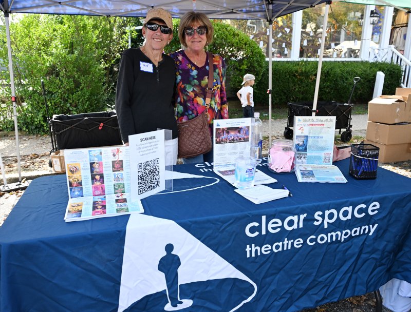 Volunteering at the Clear Space booth are MJ Tarallo, left, and Liz Leshine.