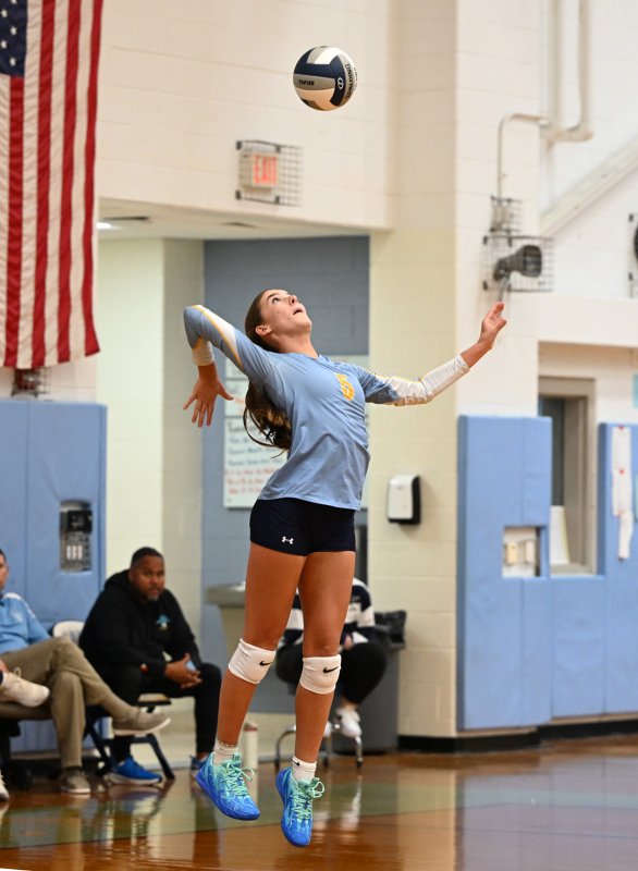 Camilla Willis serves a winner for the Vikings.
