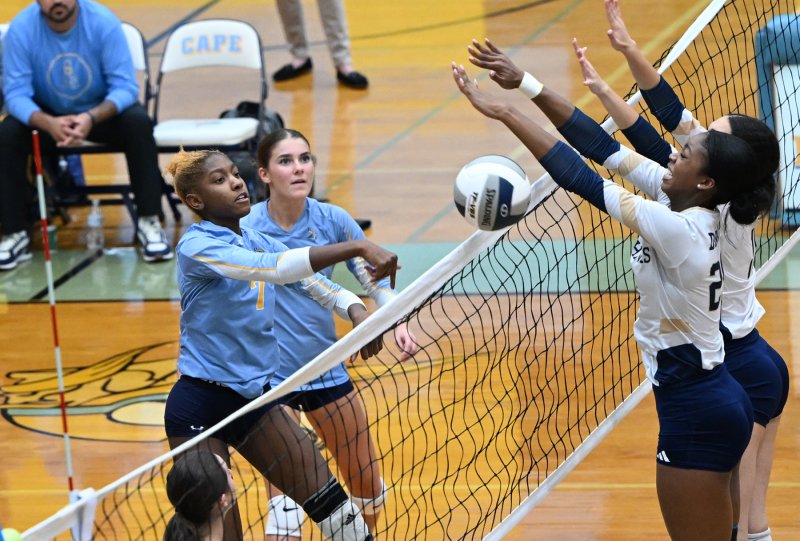 Cape senior McKenzie Everson slams a kill shot.