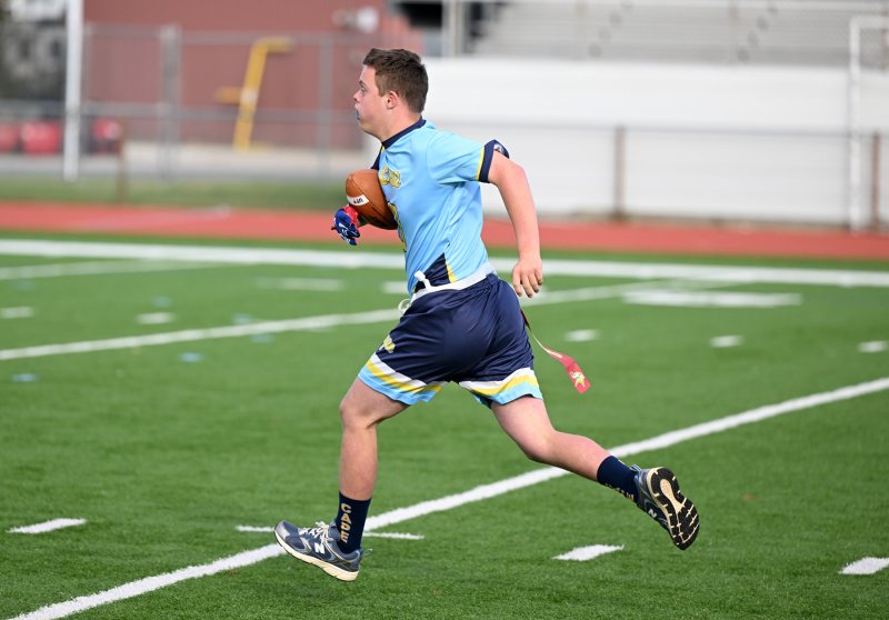 Luke Archer runs for a long gain for the Vikings.