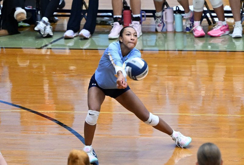 Cape sophomore Journey McDaniel bumps a serve return.