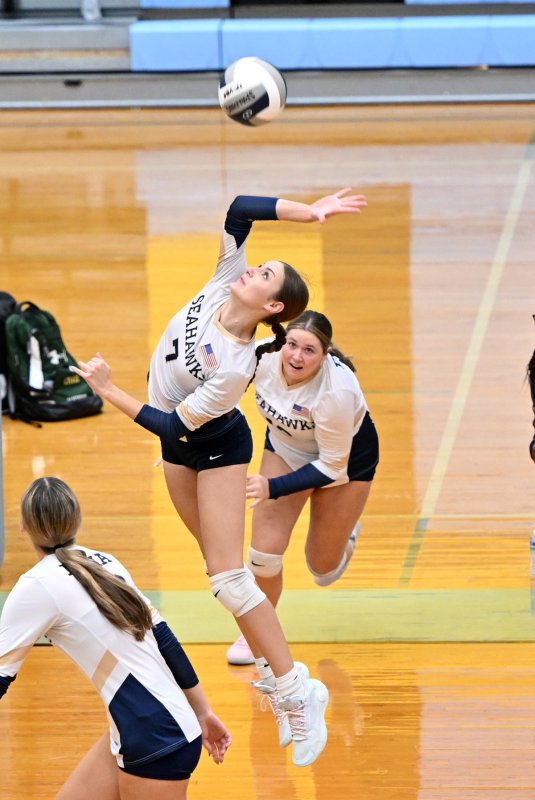 DMA junior Natalie Teixeira slams a kill shot. She garnered nine kills in the match.