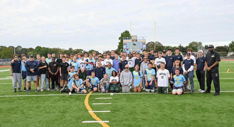 Showing great sportsmanship, the Indian River and Cape squads get together for a picture after the Indians’ 68-38 victory. DAN COOK PHOTOS