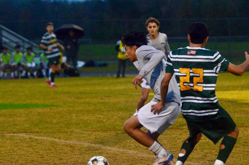 Sussex Academy senior Ruendi Ortiz-Santos works past Abdiel Mejia Garcia.