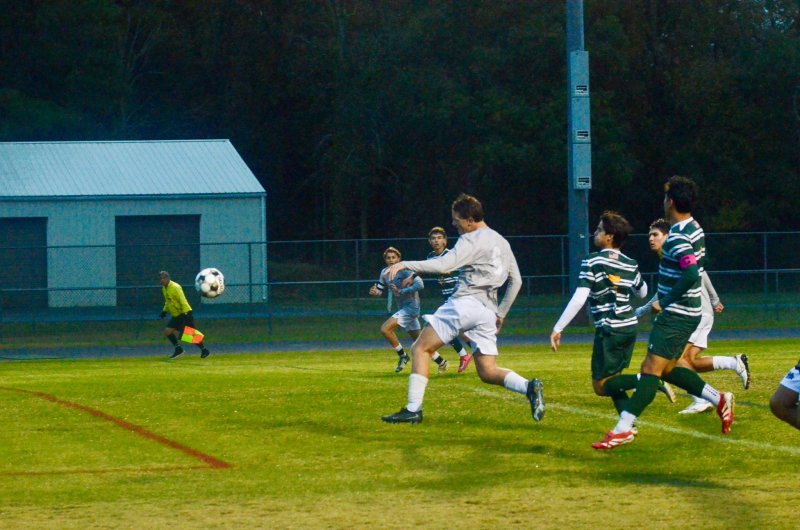 Seahawks junior Carson Klahr heads the ball toward goal.
