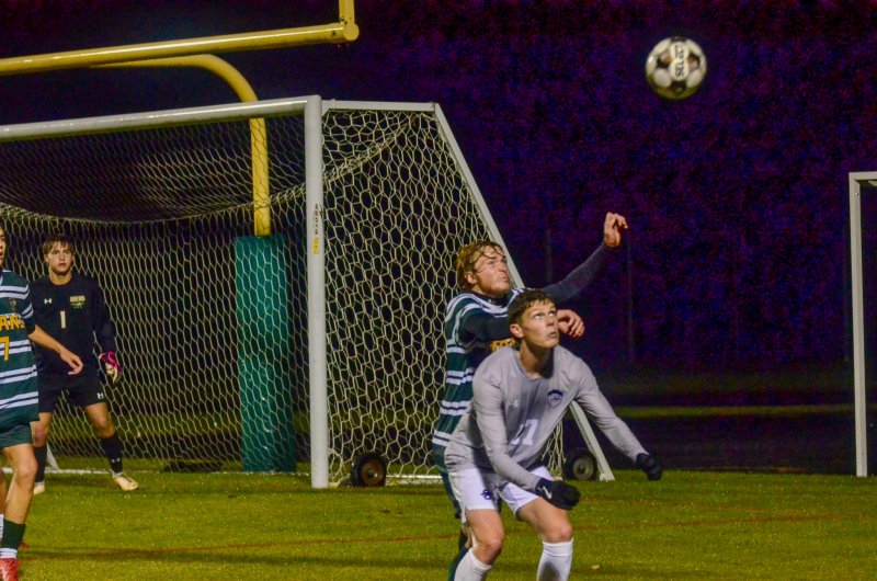 Sussex Academy senior Chase Ballinger fights for a throw in.