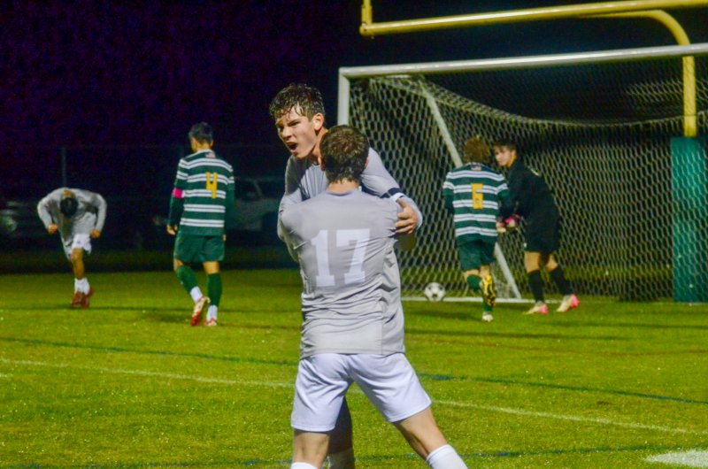 Sussex Academy senior George Sapna lets out a victory cry as he celebrates with Chase Ballinger after a goal in the 3-1 victory over Indian River Oct. 30 to clinch the Henlopen South for the Seahawks. AARON R. MUSHRUSH PHOTOS